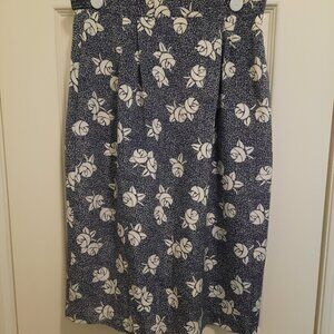 100% Polyester With Side Pockets And Fully Lined Skirt